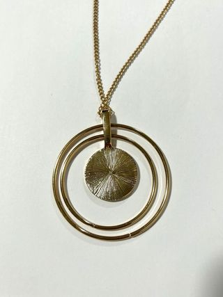 Collana con ciondolo brillantinato rosa 