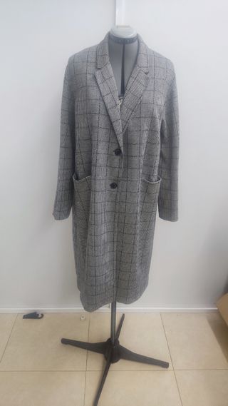 Abrigo de punto unisex.