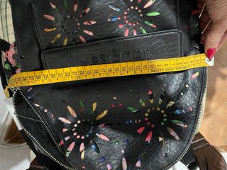 Mochila pequeña desigual con monedero