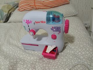 Maquina de coser de juguete con instrucciones