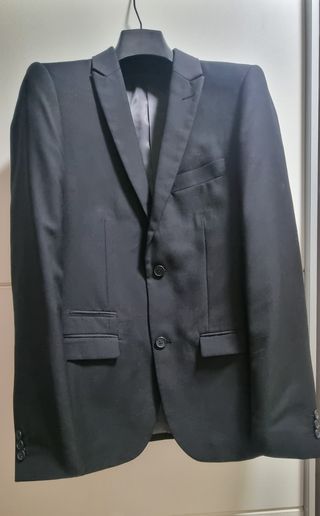Traje