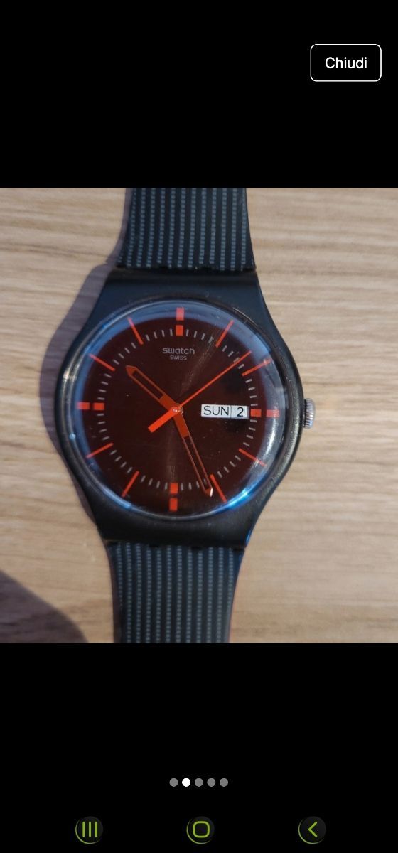 Swatch con cinturino nero e rosso