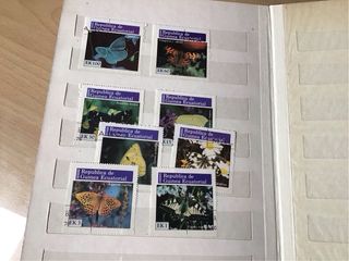 Album con 50 francobolli  tematici diversi