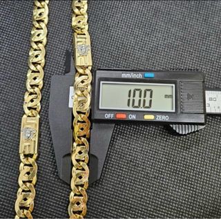 Cordon de oro 18 kl con caritas versace oro blanco
