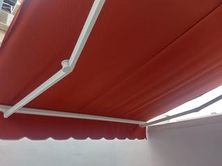 Toldo con brazos
