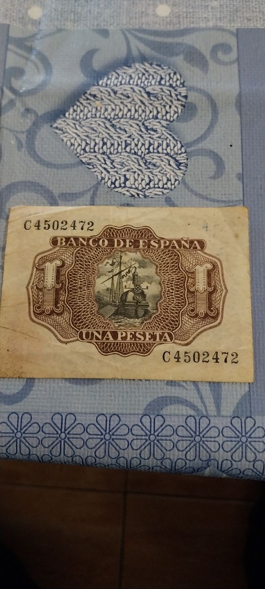 Una peseta en billete