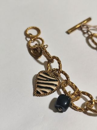 Pulsera chapado en oro. Marca Just Cavalli. Nuevo