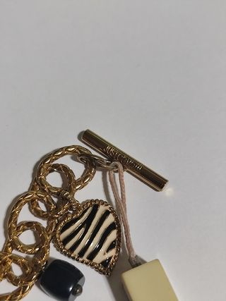 Pulsera chapado en oro. Marca Just Cavalli. Nuevo
