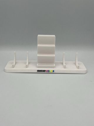Soporte Game boy color 2 consolas mas 4 juego