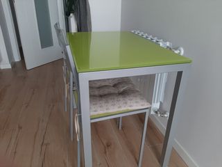 Mesa extensible con sillas Cancio