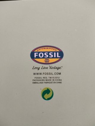 Scatola Fossil vintage di latta.