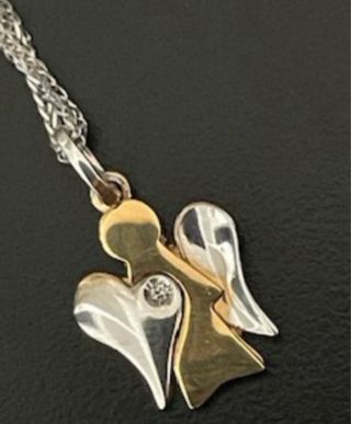 Cadena y colgante ángel oro 18 kilates