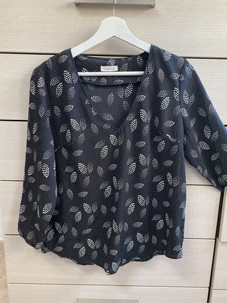 Blusa blanca y negra