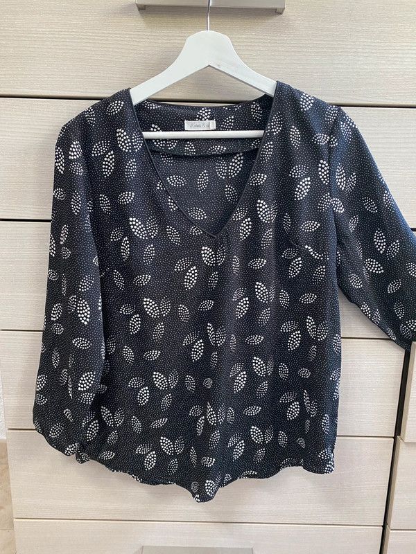 Blusa blanca y negra