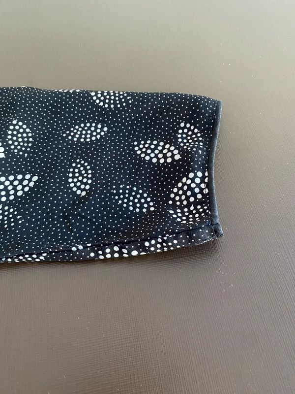 Blusa blanca y negra