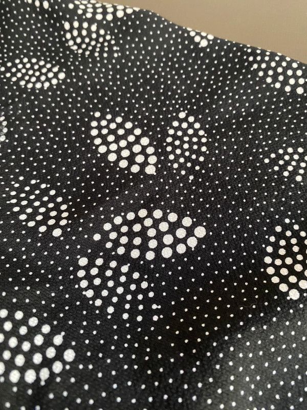 Blusa blanca y negra