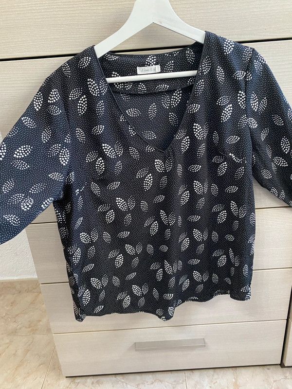 Blusa blanca y negra