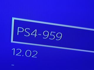 PS4 Slim 1TB con caja, juego FFXV y base de carga.