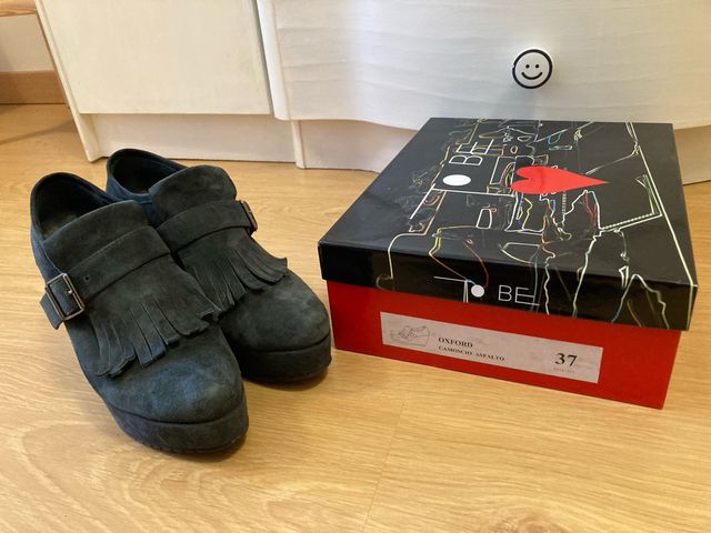 Botines elegantes con plataforma corrida