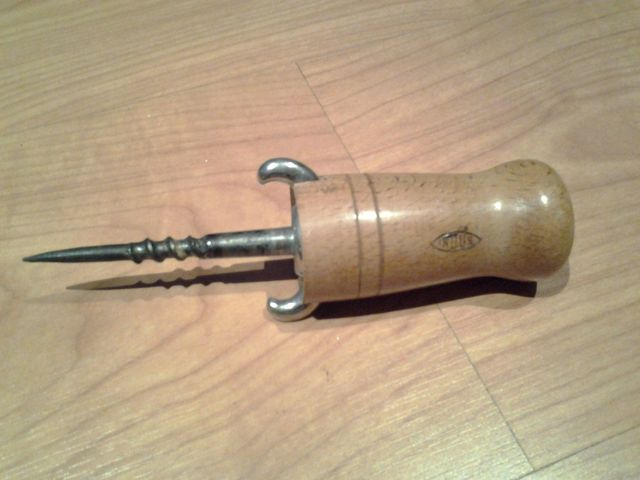 Abridor indus bellota.