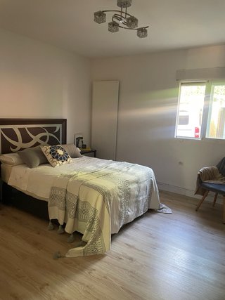 Habitación de matrimonio en madera natural