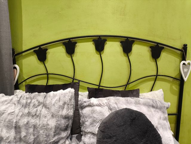 Cabezal hierro forjado tulipanes