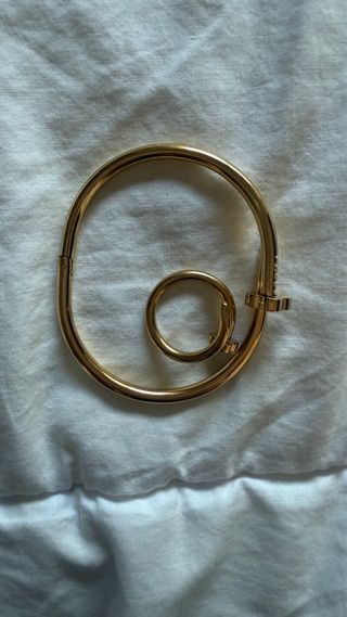 Pulsera y anillo clavo