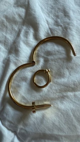 Pulsera y anillo clavo