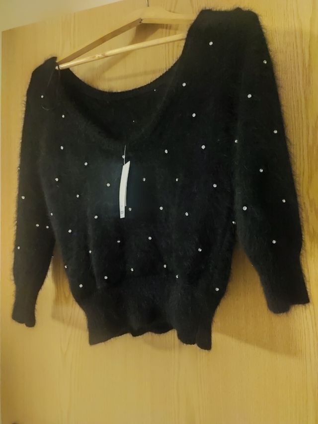 Jersey con brillantes en color negro