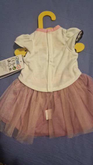 Baby abbigliamento e mini bambolina