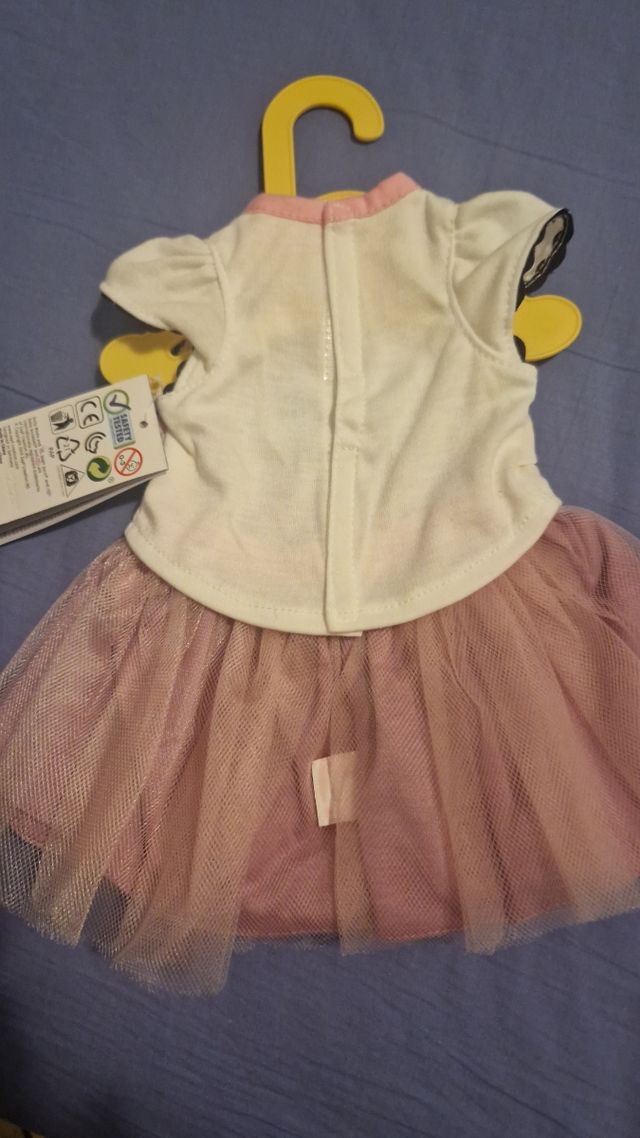 Baby abbigliamento e mini bambolina