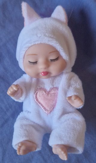 Baby abbigliamento e mini bambolina