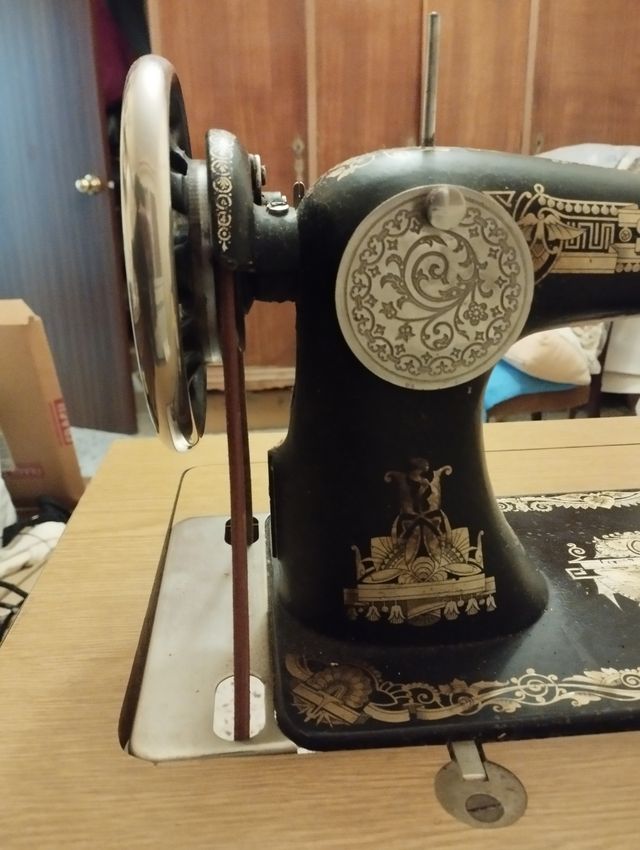 Maquina de coser Singer