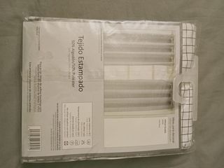 Dos cortinas con ollaos sin estrenar