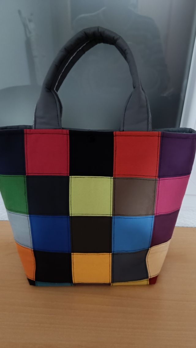 Precioso bolso de tapicería