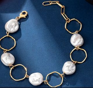 Pulsera baño oro y perlas. Nueva.