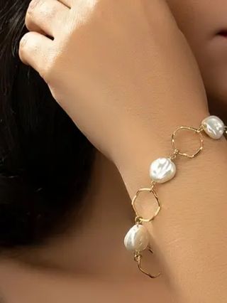 Pulsera baño oro y perlas. Nueva.