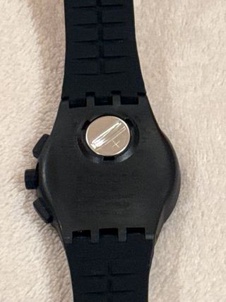 Reloj de Swatch negro y verde