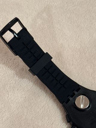 Reloj de Swatch negro y verde
