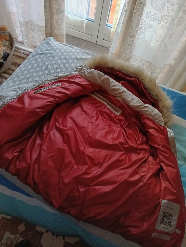 Piumino unisex hetregò