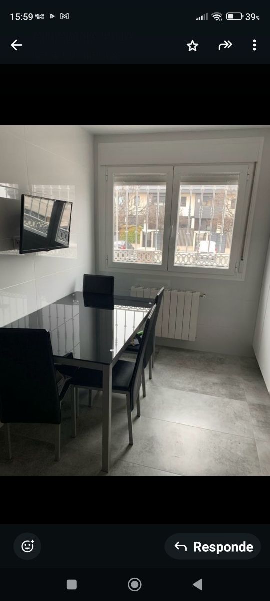 Mesa cristal negro y cuatro sillas