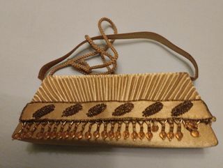 BOLSO DE FIESTA DORADO