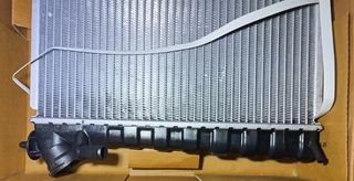 Radiador berlingo. p306. parnet