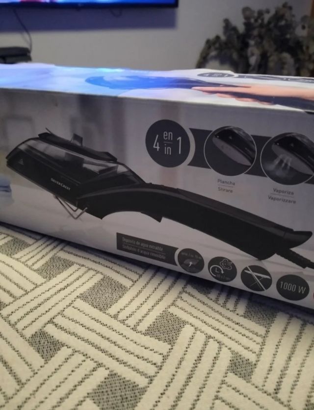 Plancha y cepillo de vapor vertical