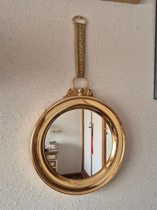 Espejo de pared dorado