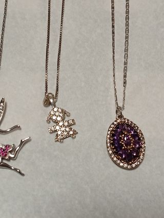 Lotto di 9 collane con pendenti argento