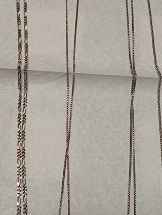 Lotto di 9 collane con pendenti argento