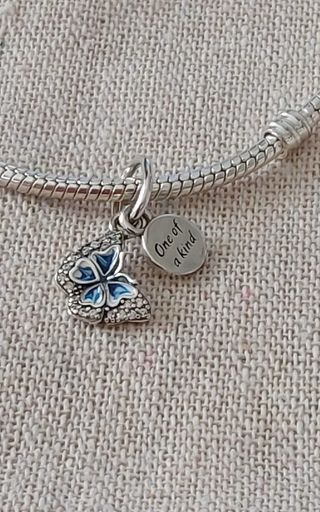 Colgante doble mariposa azul plata