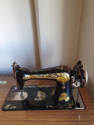 Máquina de coser antigua SINGER  con mueble