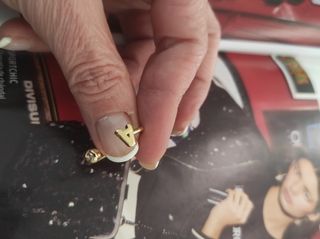 Anillo fino letra 18K